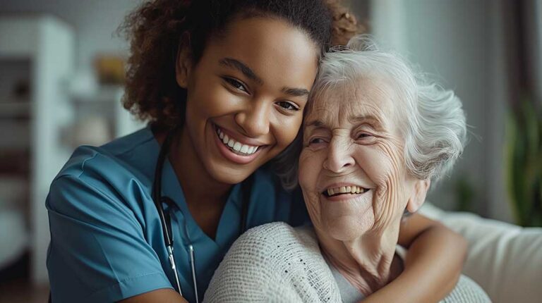 Older adults socializing in a bright common room with comfortable seating and natural light.